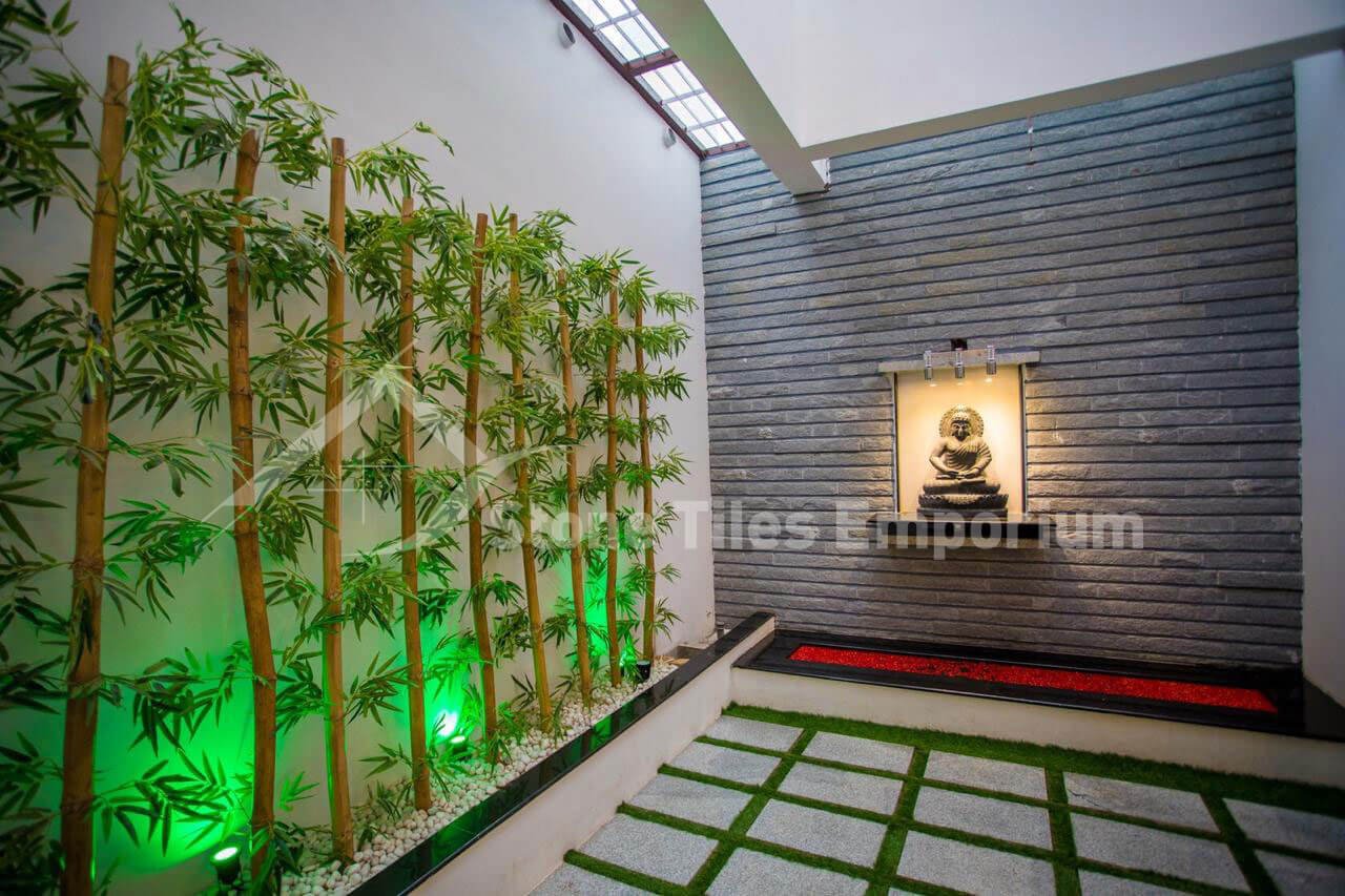 Sira stone cladding courtyard with Buddha niche