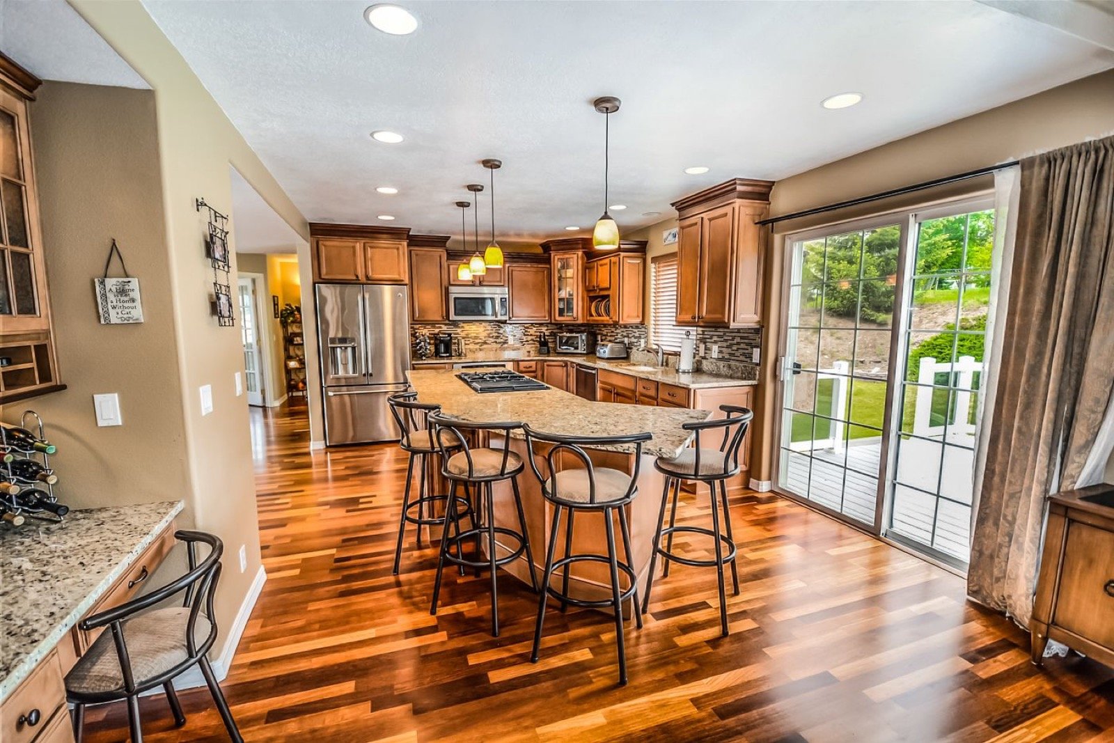 Granite kitchen counters and stone backsplash