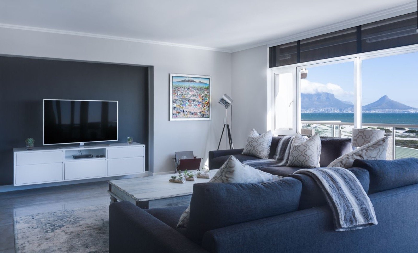 Large-format vitrified floor tiles in a living room